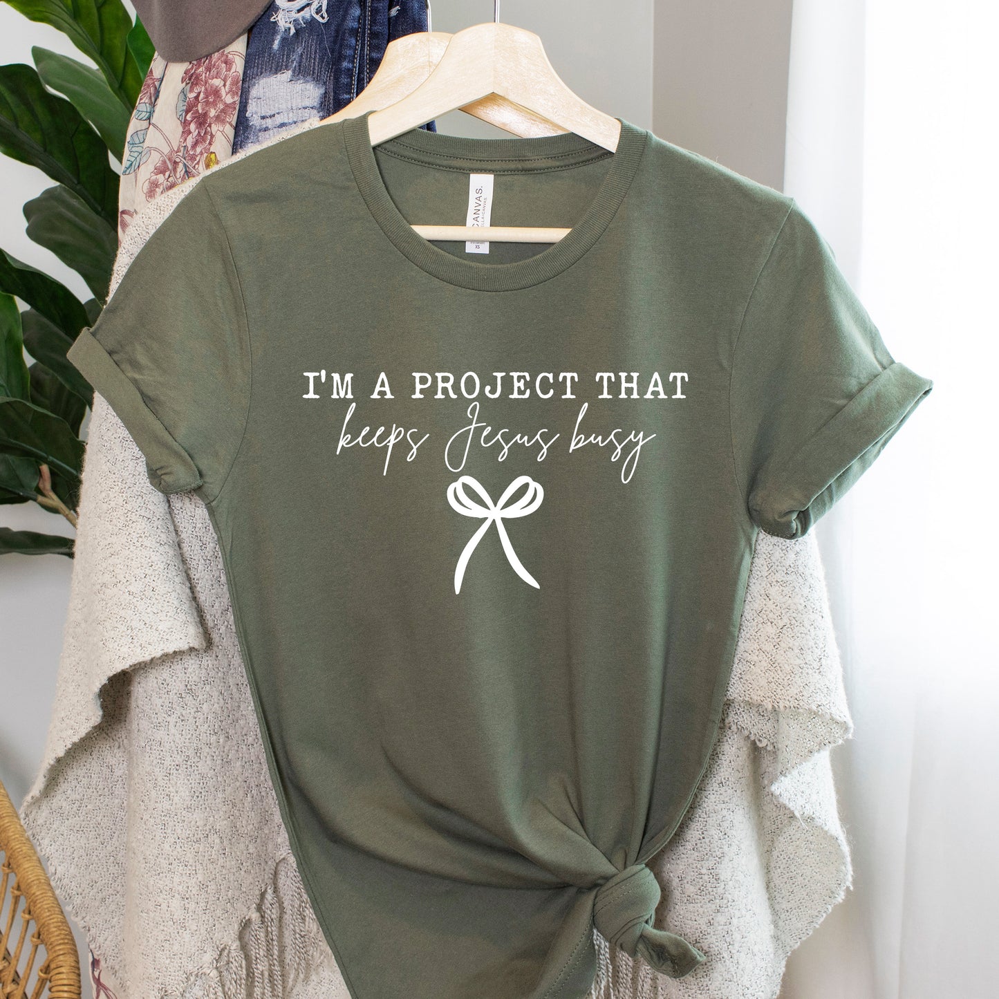 I’m a Project That Keeps Jesus Busy Graphic T-Shirt | Unisex Christian Tee